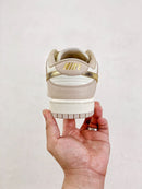 Nike Dunk Low "Gold Swoosh"